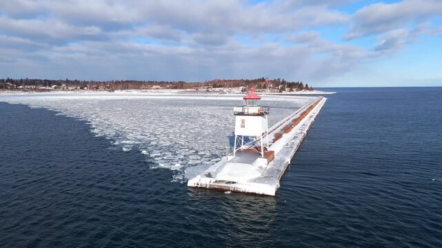 Light house in Two Harbors Minnesota during a winter cold day in Lake Superior with ice formations 2