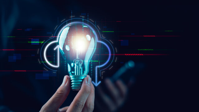 Innovation strategist integrates cloud computing with glowing light bulb, showcasing creative thinking, data driven solutions, digital transformation, smart technology, scalable infrastructure