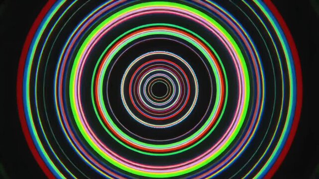 Neon concentric circles. Colorful ring pattern. Black background. Glowing neon lines. Vector illustration. Abstract design element. Geometric shape. Radial pattern. Bright colors. Modern