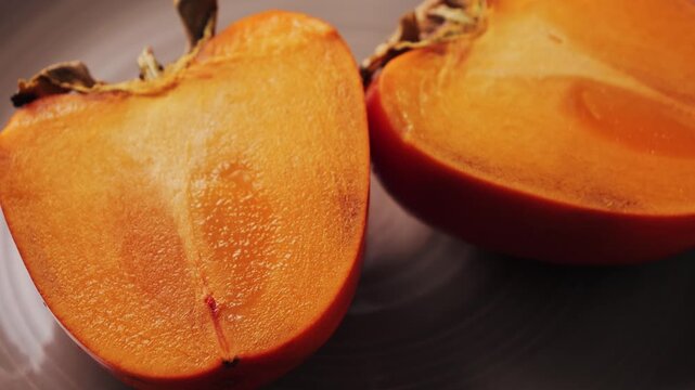 Juicy fresh sweet persimmon. Source of antioxidants and vitamins.