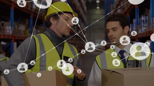 Animation of network of connections with people icons over caucasian men working in warehouse