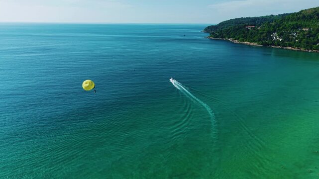 Aerial view of Karon beach and coastal scenery on Phuket island, Thailand.