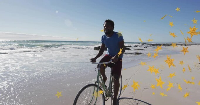 Man starting pedaling green city bike near shore, avoiding rocks for leisure, yellow stars drifting