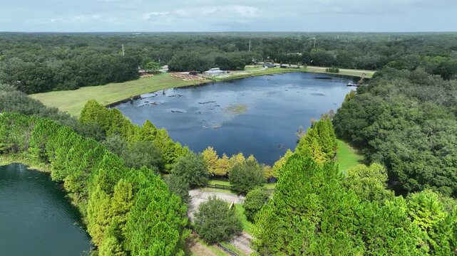 A high-altitude view over the lake and countryside of Club Lake Venue.