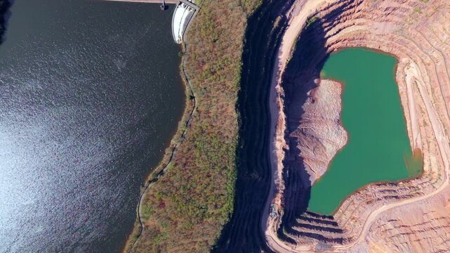 Aerial view of ancient Buddon Wood between Swithland Reservoir and Mountsorrel Quarry in Leicestershire UK