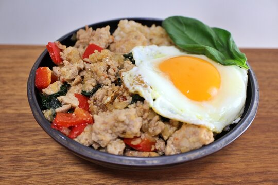 Thai home cooking: phat kaphrao mu sap (ground pork stir-fry with holy basil), served with a fried egg