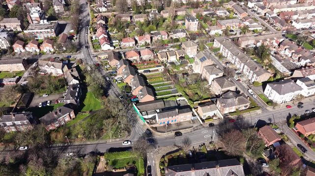 4K aerial video showing Birkenhead Merseyside with residential streets and family housing areas.