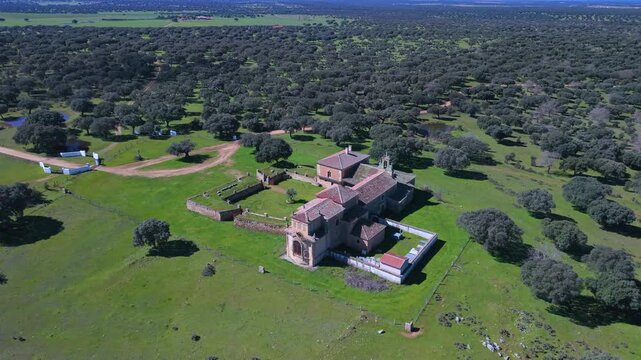 Aerial view from a drone of holm oak pastures near the Hermitage of Our Lady of Cueto. Campo Charro. Campo de Salamanca region. Salamanca. Castile and Le&oacute;n. Spain. Europe