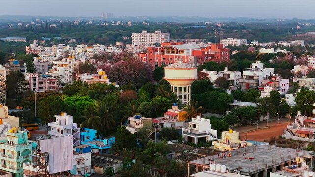 Bangalore City Skyline at Sunrise with Residential Buildings and Water Tank