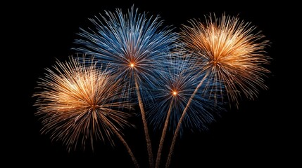 Fototapeta premium Colorful Explosion of Fireworks in Night Sky with Bright Blue and Orange Bursts for Celebration and Festive Events