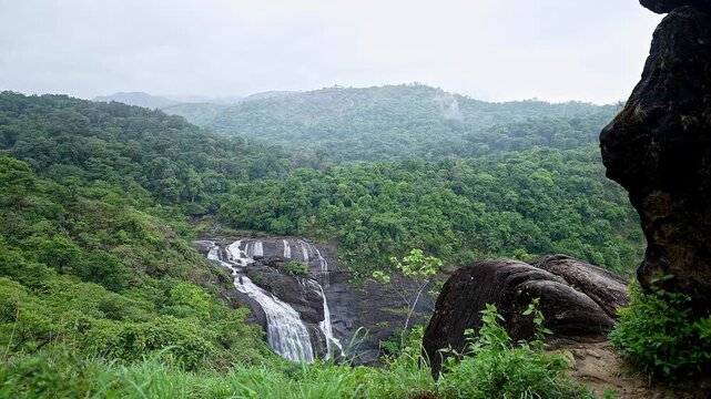 Epic view of lush forested mountains and Mallalli Waterfalls in Karnataka&rsquo;s Western Ghats