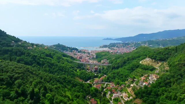 Aerial view rising toward Rapallo harbor and coastal cityscape in Liguria, Italy
