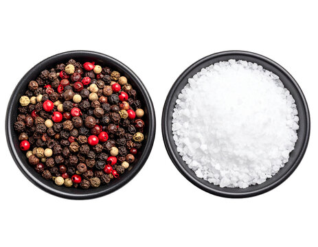 Top view of salt and black pepper in small bowls isolated on white background, overhead seasoning set cutout for restaurant menu and food styling compositing