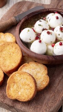 Boursin round creamy goat cheese in oil with red pepper