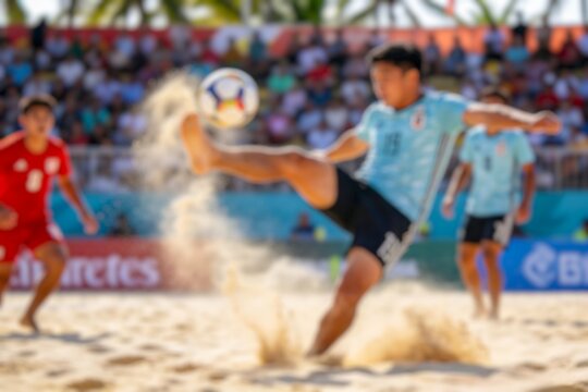 Blurry Athletes competing in beach soccer at Asian Beach Games, showcasing speed, teamwork, and intense action on sandy coastal arena.