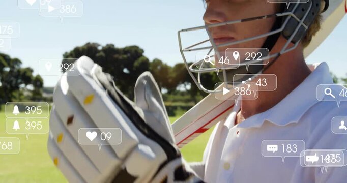 Animation of icons and data processing over caucasian male cricket player