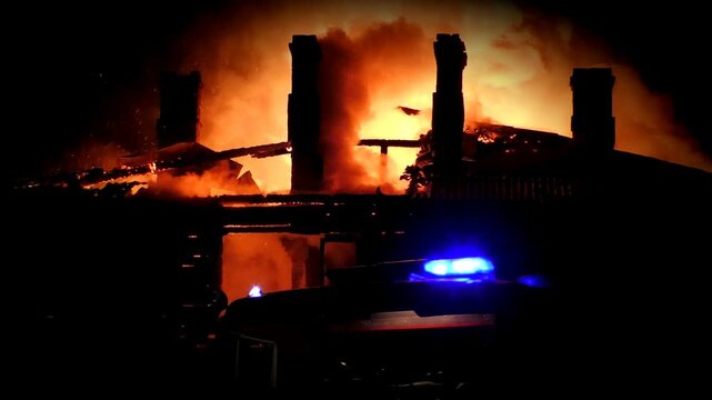 The house is on fire. A scary video of a burning dwelling.
