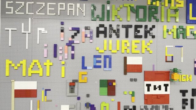 Collaborative pixel art canvas with colorful text and tiles
