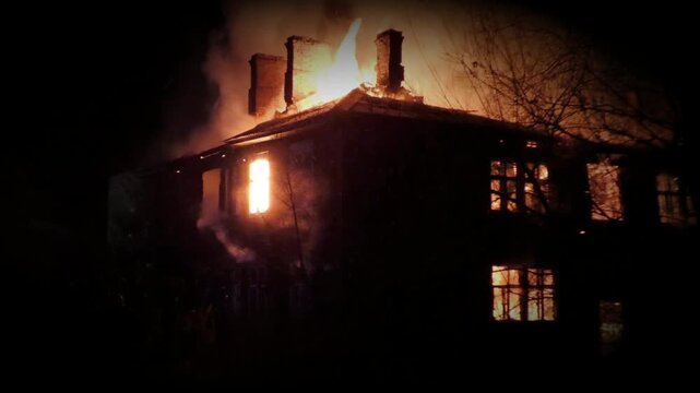 The house is on fire. A scary video of a burning dwelling.