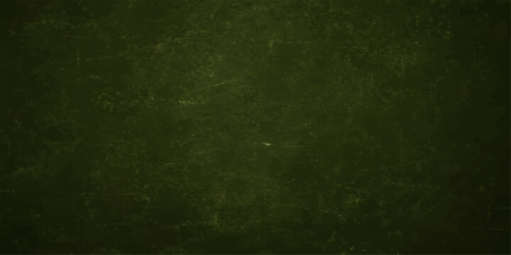 A vintage aged green grunge background features a dark textured paper pattern with rough blank copy space on a dirty retro wall canvas