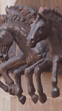 Varanasi, Uttar Pradesh, India. horses statues bas-relief in Deshbandhu Chittaranjan Das Park. c...