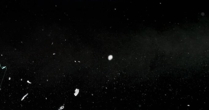 The video features stunning slowmotion footage of fragile glass shattering against a black backdrop, perfect for enhancing motion graphics and creating lasting dynamic visual effects