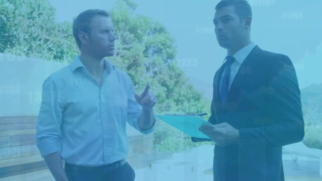 Composite image of two businessmen shaking hands against tall building in background