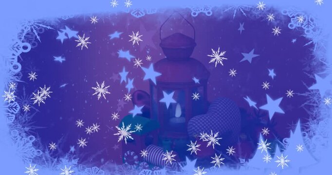 Animation of snow falling over christmas lanters decoration and winter scenery