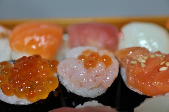 Ikura (salmon roe) and sweet shrimp temari-zushi (ball-shaped sushi) purchased at a supermarket in Tokyo, Japan