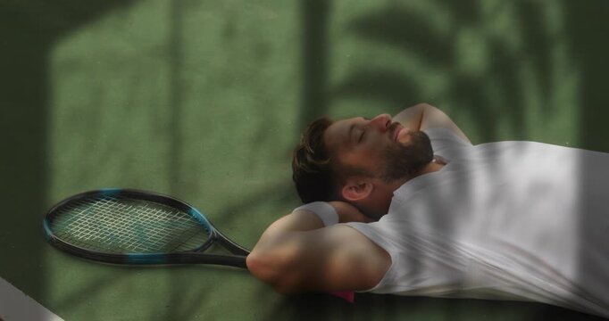 Male tennis player resting on court, showing animated sports data bars above racket and wristband