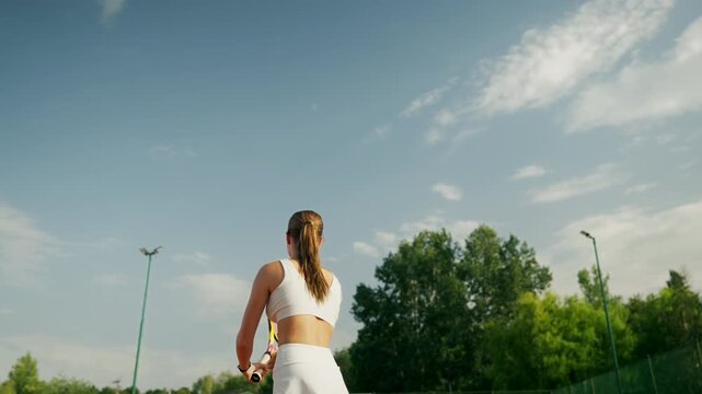 Bright Woman Exercises, Relaxed Woman In Sunlight Practicing Breathing And Stretching On Tennis Baseline
