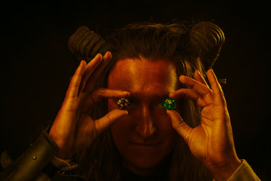 Tiefling with two d20 dice