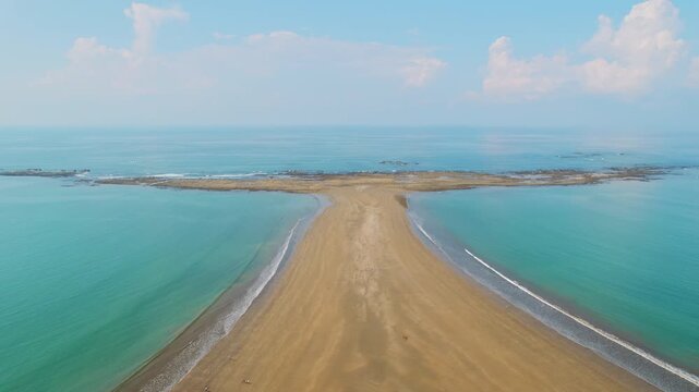 Aerial view of Whale Tail sand formation and ocean in Marino Ballena Park Costa Rica