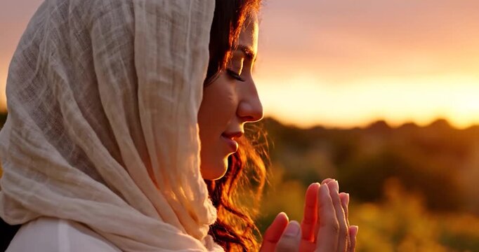 Young Muslim Woman Praying at Sunset