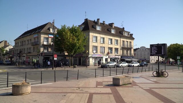Vintage French architecture background with copy space in blue summer sky, Creil, northern France.