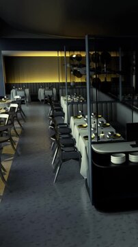 The restaurant shows tables set for dining with simple decor. A kitchen area is visible in the background. Lighting creates a warm atmosphere during evening hours.