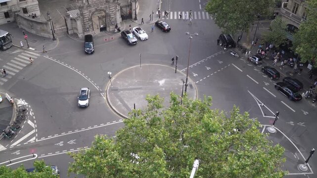 High angle view of Place Diaghilev roundabout with almost empty street in Paris, France.