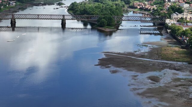 cachoeira, bahia, brazil - june 23, 2025: View of the iron bridge that connects the cities of Cachoeira and Sao Felix in Bahia.