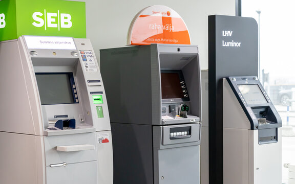 Tallinn, Harju, Estonia - 04.04.2026: ATMs of different banks including SEB, Swedbank and LHV for cash withdrawal and banking operations indoors.
