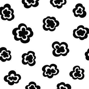 Seamless pattern with black popcorn silhouettes on transparent background for fabric and wallpaper design.