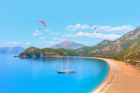 Black gulet anchored at the Aegean sea - Panoramic view of Oludeniz Beach And Blue Lagoon, Oludeniz beach is best beaches in Turkey - Fethiye, Turkey