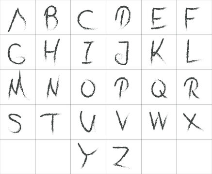 Handwritten alphabet letters in a grid layout