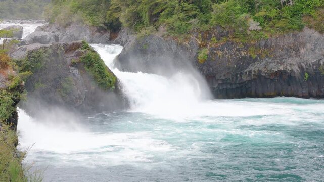 Petrohu&eacute; Falls: Stunning turquoise waterfalls in Vicente P&eacute;rez Rosales National Park, Chile. Natural landscape of crystal-clear water and Valdivian forest in the Los Lagos Region, Chilean Patagonia.