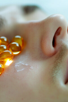 Person with excessive fish oil on eyes, often used in beauty or wellness related content