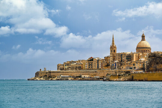 Iconic Valletta skyline with Carmelite Church dome and St Paul's Pro-Cathedral, Malta