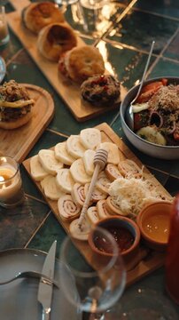 Traditional Georgian supra table filled with a wide variety of dishes, showcasing rich food culture, hospitality, and celebration.