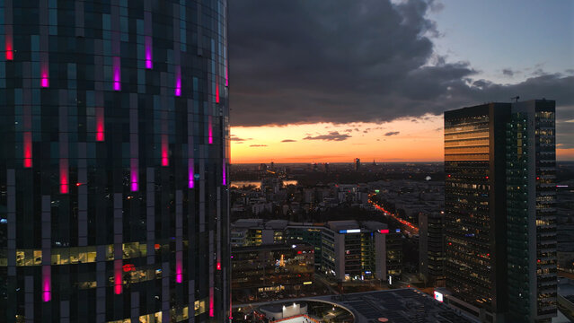 Bucharest cityscape at dusk featuring modern skyscrapers