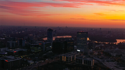 Fototapeta premium Bucharest urban skyline with colorful sunset sky