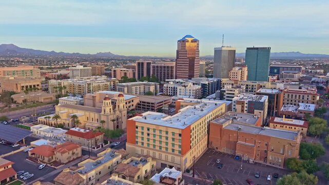 Wide aerial panorama shows Tucson skyline and surrounding desert landscape in Arizona