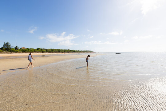 family exploring beach, Vilankulos, Mozambique, Africa